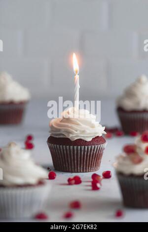 Red velvet cupcakes on a white work surface Stock Photo