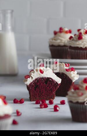 Red velvet cupcakes on a white work surface Stock Photo