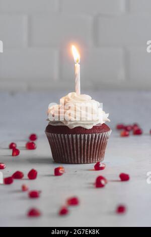 Red velvet cupcakes on a white work surface Stock Photo