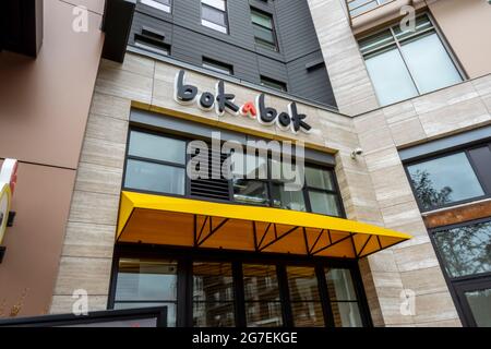 Kirkland, WA USA - circa July 2021: Low angle view of a Bok A Bok fried chicken restaurant in Totem Lake. Stock Photo