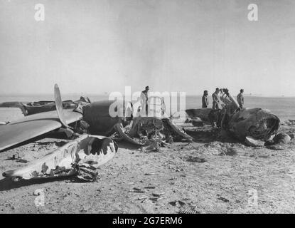 Lockheed P-38 of the 1st Fighter Group that was wrecked on the runway due to a collision with another P-38 Lighning at Biskra, North Africa, January 1943 Stock Photo