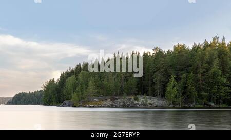 Long exposure photo of quiet Island on Finnish lake Päijänne Stock Photo