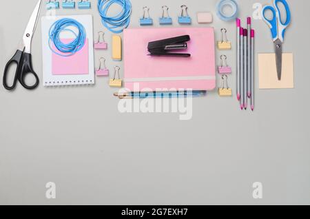 Different school supplies on light grey background Stock Photo