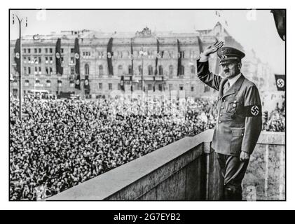 ADOLF HITLER VICTORY PARADE CROWDS CONGRATULATING FRENCH NAZI OCCUPATION Vintage WW2 Adolf Hitler at the zenith of his evil charismatic power on the balcony at a Victory Parade in Berlin, July 1940, after the successful invasion and occupation of France Stock Photo