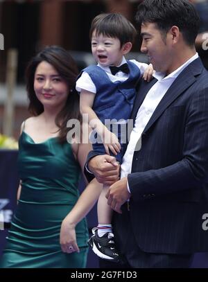 LOS ANGELES, CA – JULY 19: Tim Anderson of the Chicago White Sox poses for  a photo with family during the All-Star Red Carpet Show at L.A. Live on  Tuesday, July 19