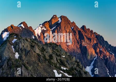 Warrior Peak, dramatic in dawn light, viewed from Marmot Pass in the Buckhorn Wilderness, Olympic National Forest, Olympic Mountains, Washington State Stock Photo