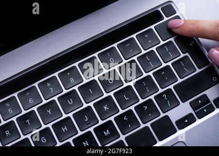 Hands Pointing Pressing Computer Keyboard Keys Typewriting New Ideas. Fingers Tapping Typing Fresh Thoughts Using Wireless Notebook Keypad. Stock Photo