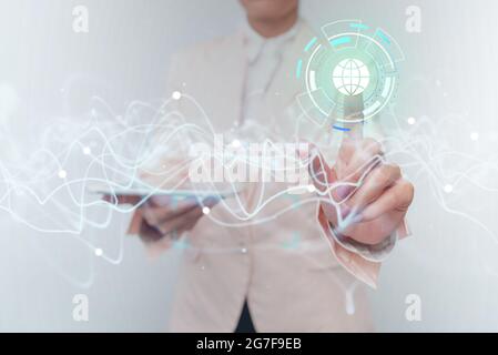 Lady In Uniform Using Futuristic Digital Mobile Interface Technology. Woman Holding Phone And Pen Interacting With Advanced Holographic Display Screen Stock Photo