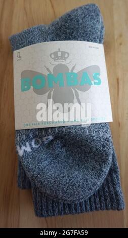 New pair of Bombas socks in blue Stock Photo