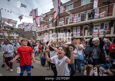 EURO 2020: England vs Italy. Residents of the Kirby estate in Bermondsey celebrate at Luke Shaw’s early goal for England during the match finals. Stock Photo