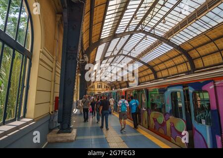 PIRAEUS, ATTICA, GREECE- JULY 2017. Inside the historical train (& metro) station at the port of Piraeus. Urban scenery with traffic of travelers and Stock Photo