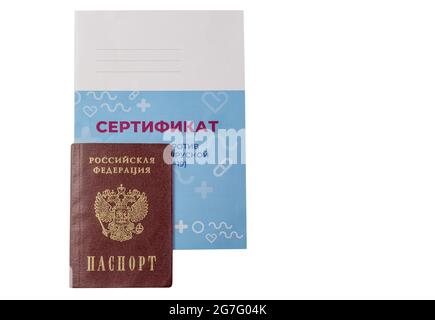 A certificate of vaccination is enclosed in the Russian passport. Translation: certificate of vaccination against a new coronavirus infection (COVID-1 Stock Photo