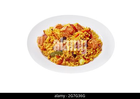 Plate of pilaf with lamb, carrot and dried fruits isolated on white Stock Photo