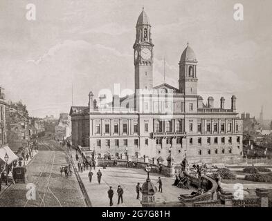 A late 19th century view of Paisley Town Hall, in Paisley, Renfrewshire, Scotland built when civic leaders needed a public hall in which to hold concerts and other public events. The foundation stone was laid on 22 October 1879 to a design by William Henry Lynn and William Young in the Classical style, with two towers, the taller of which contained a clock. Stock Photo