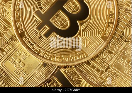 Backgrounds and textures: group of golden bitcoin coins, close-up shot Stock Photo