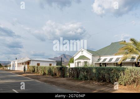 KLAARSTROOM, SOUTH AFRICA - APRIL 21, 2021: A street scene in Klaarstroom in the Western Cape Province. A guest house and other buildings are visible Stock Photo
