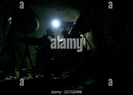 Drill Rig in Underground Mine Stock Photo
