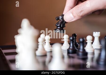 Chess game to development analysis new strategy plan Stock Photo - Alamy