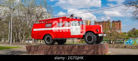 KRASNODAR - MAY 21, 2021: Fire Car Zil from Soviet time, Fire Engine Retro Soviet Car Oldtimer at Krasnodar, background blue cloudy sky, Panorama Stock Photo