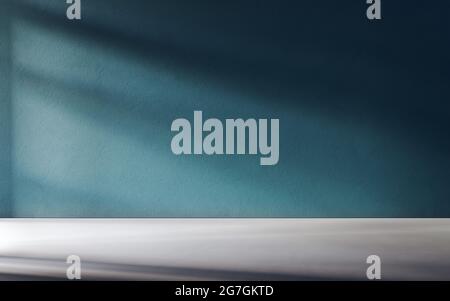 3D rendering of empty room. Concrete floor and teal wall, light coming through windows from left side. Stock Photo