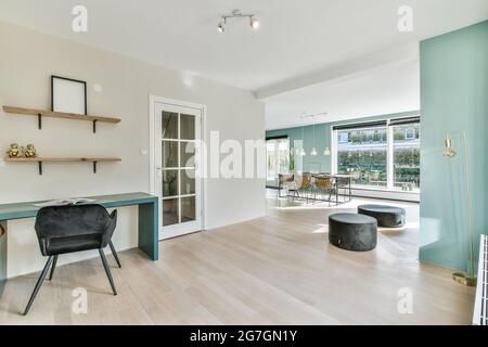 A cozy living room with big stylish sofa Stock Photo