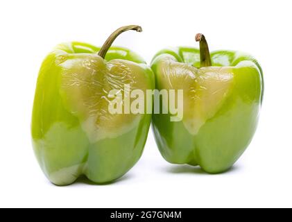 Rotten green bell pepper isolated on white background Stock Photo