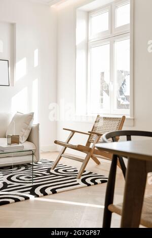 Beautiful modern living room with sofa and floor lamp Stock Photo - Alamy