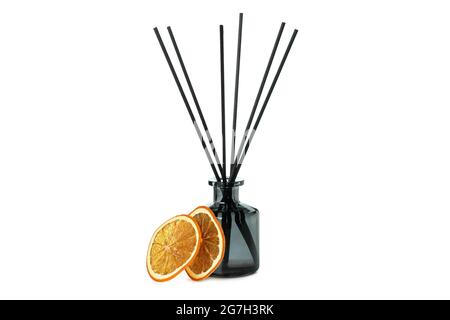 Diffuser bottle with sticks and orange slices isolated on white background Stock Photo