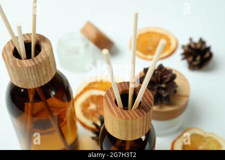 Diffusers, lemons and cones on white background Stock Photo