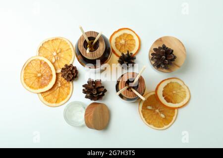 Diffusers, lemons and cones on white background Stock Photo