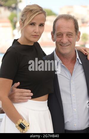 July 14, 2021, CANNES, France: (L to R) VINCENT LINDON and Director JULIA DUCOURNAU attend the ''Titane'' photocall during the 74th annual Cannes Film Festival in Cannes, France. (Credit Image: © Frederick InjimbertZUMA Wire) Stock Photo