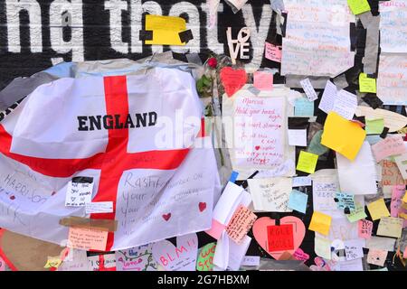 Close up of a small part of the giant Manchester United player Marcus  Rashford mural in Withington, Manchester, England, United Kingdom, that was  vandalised with abusive graffiti after England's Euro2020 football loss