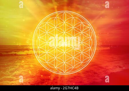 Flower of Life Symbol in a cosmic field of glowing light Stock Photo