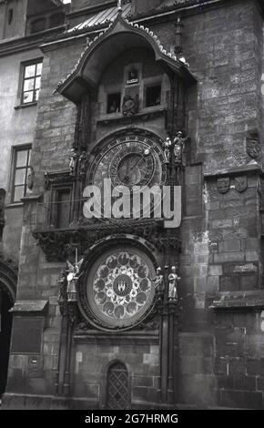1930s, historical view from this era of the Prague Astronomical Clock on the exterior of the old town hall, Prague, Czechoslavkia. Installed in 1410, the clock is the world's third-oldest astronomical clock. Stock Photo