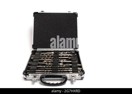 Set was drilled on concrete in a metal suitcase on a white background Stock Photo
