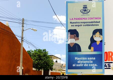 Covid-19 Prevention Billboard in Merida Mexico Stock Photo