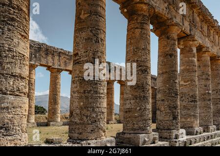 Doric Temple of Segesta,Sicily,Italy.European archeological historical site surrounded by green and quiet countryside.Summer holiday vacation concept. Stock Photo