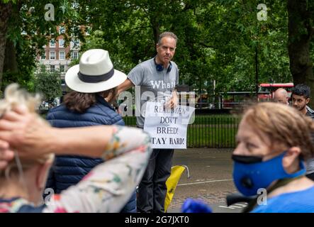 London. UK- 07.11.2021. A man speaking and debating with a  crowd of people in Speakers' Corner. Stock Photo