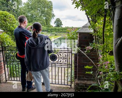 London. UK- 07.11. 2021. Tourists and visitors sightseeing in Princess Diana Memorial Garden. Stock Photo