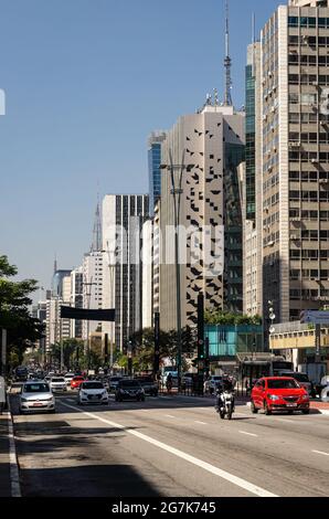 Southeast view of Paulista Avenue between Pamplona street and Rio Claro alameda with the usual traffic passing by in a normal business day. Stock Photo