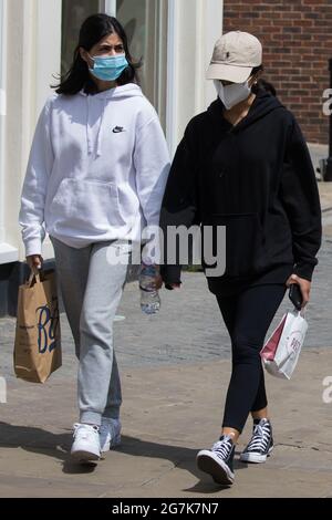 Windsor, UK. 14th July, 2021. Shoppers wear face coverings in the town centre ahead of the lifting of legal restrictions on social contact. The UK government announced on 12th July that England will move to the final stage of easing Covid-19 restrictions on 19th July but they also advised the public to exercise caution given that the current wave driven by the Delta variant is not expected to peak until mid-August. Credit: Mark Kerrison/Alamy Live News Stock Photo