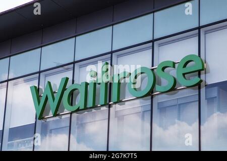 Windsor, UK. 14th July, 2021. The sign outside a branch of Waitrose in Windsor town centre. John Lewis and Waitrose have announced plans to cut 1,000 jobs as part of a shake-up of store management to follow the closure of eight John Lewis stores earlier this year. Credit: Mark Kerrison/Alamy Live News Stock Photo