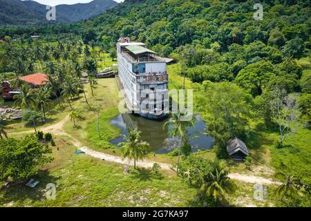 Abandoned Boat Chalet, Ghost Ship in Grand Lagoona, Koh Chang, Trat, Thailand Stock Photo