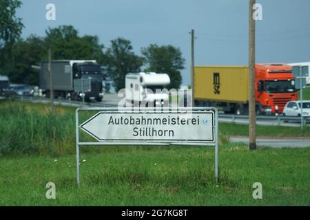 14 July 2021, Hamburg: Vehicles take the Stillhorn exit on the A1 motorway. In view of the expected travel traffic at the weekend, the ADAC has warned of longer traffic jams in Hamburg, Schleswig-Holstein and Mecklenburg-Western Pomerania. In addition to the construction work for the extension of the A7 north and south of the Elbe tunnel, the reconstruction of the A255 continues. On the so-called Veddel branch, which connects the A1 (Bremen-Lübeck) and the B75 (Harburg - Hamburg-Centrum) with the Elbe bridges, only one lane in each direction will be available to motorists. (to dpa 'ADAC warns Stock Photo