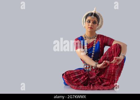 Odissi dancer striking a pose Stock Photo