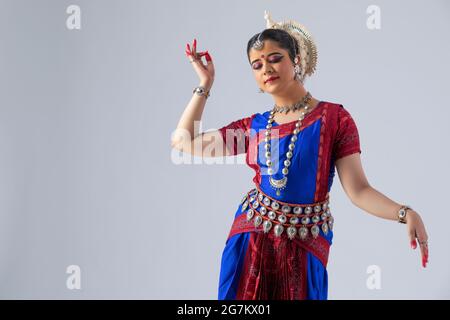 Odissi dancer striking a pose Stock Photo