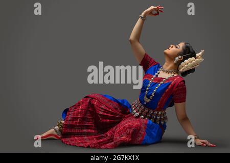 Odissi dancer striking a pose Stock Photo