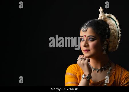Odissi dancer striking a pose Stock Photo