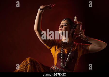 Odissi dancer striking a pose Stock Photo