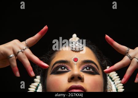 Odissi dancer striking a pose Stock Photo